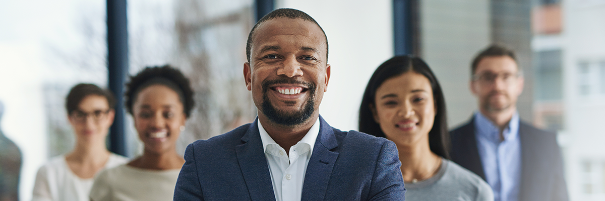 group of supply chain professionals smiling