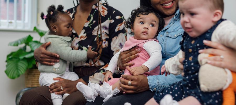 three babies of different races