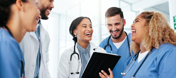 Medical staff happy and laughing together
